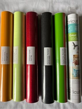 Cricut Vinyl Rolls in Orange, Lime, Red Glitter, Black, Bright Green, White